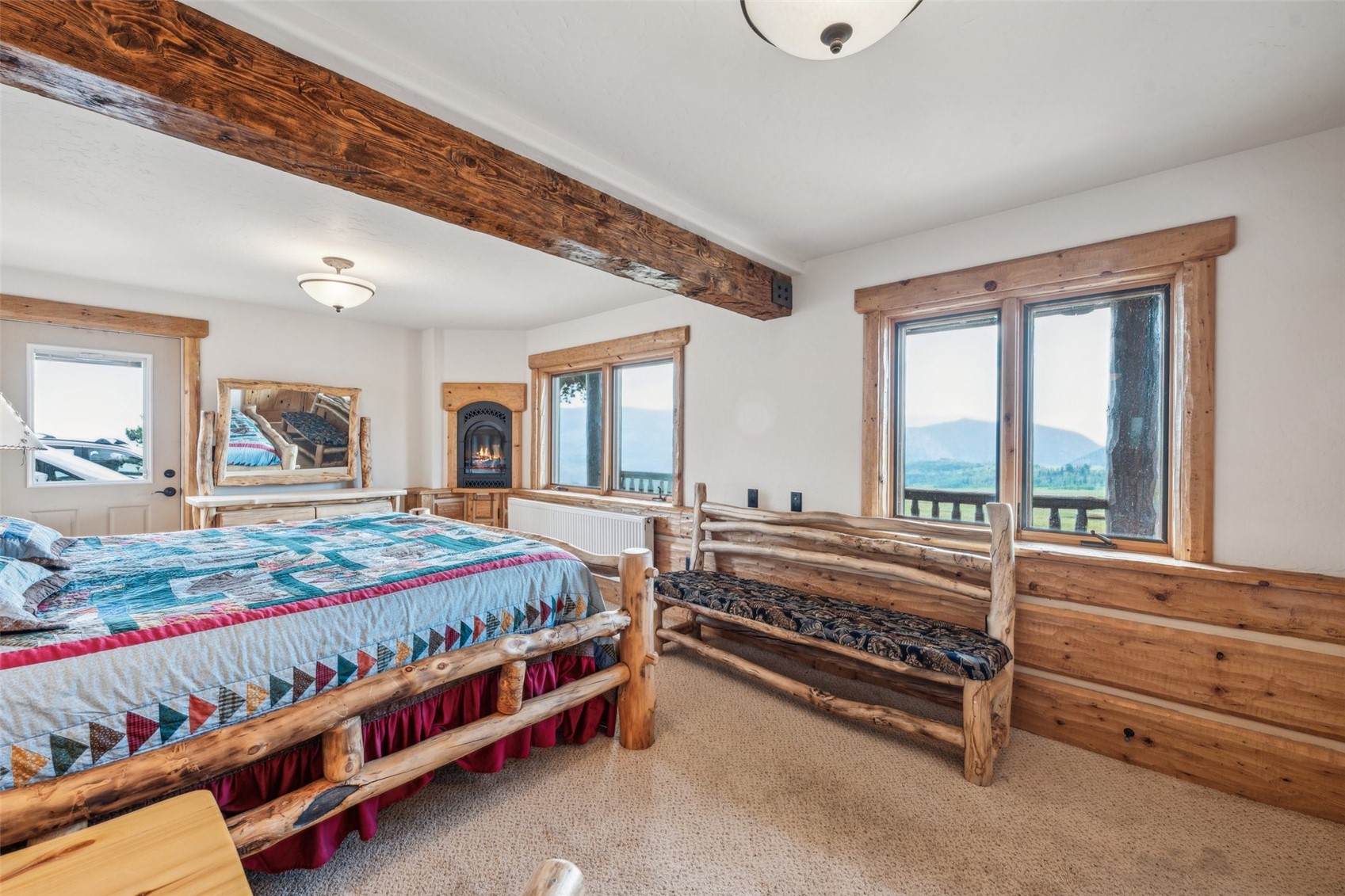 733 Spring Creek Ranch Road Silverthorne, CO 80498 - Photo 24 of 34 a bed room with a bed and a window