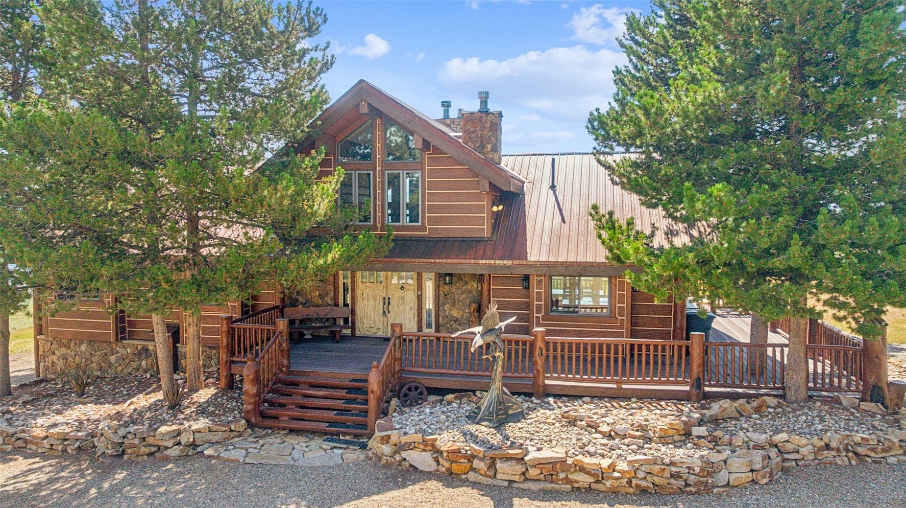 733 Spring Creek Ranch Road Silverthorne, CO 80498 - Photo 27 of 34 a front view of a house with garden