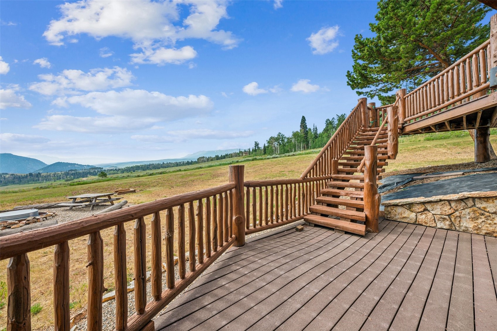 733 Spring Creek Ranch Road Silverthorne, CO 80498 - Photo 28 of 34 a view of balcony with wooden floor and fence