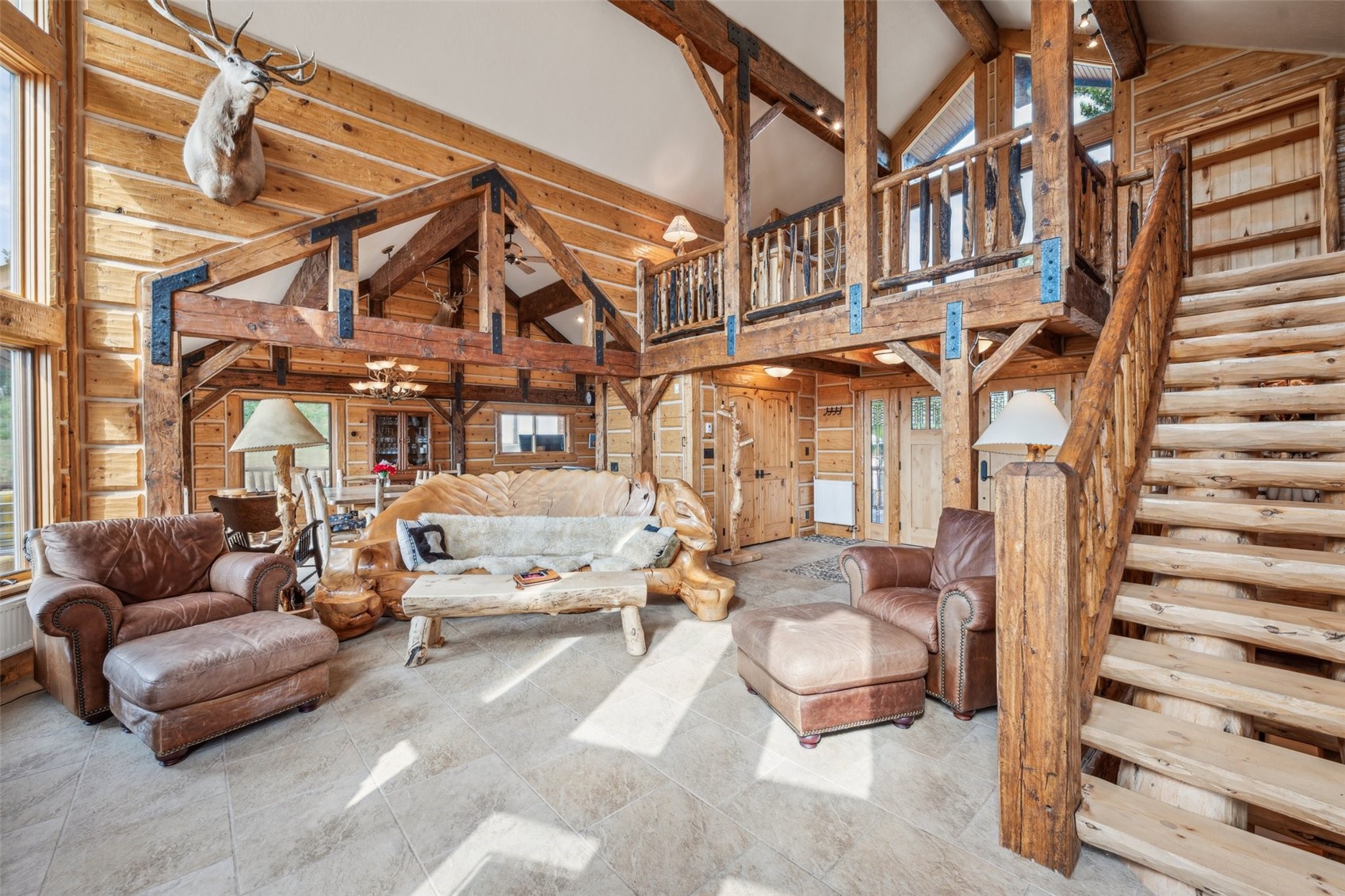 733 Spring Creek Ranch Road Silverthorne, CO 80498 - Photo 7 of 34 a building outdoor space with patio furniture