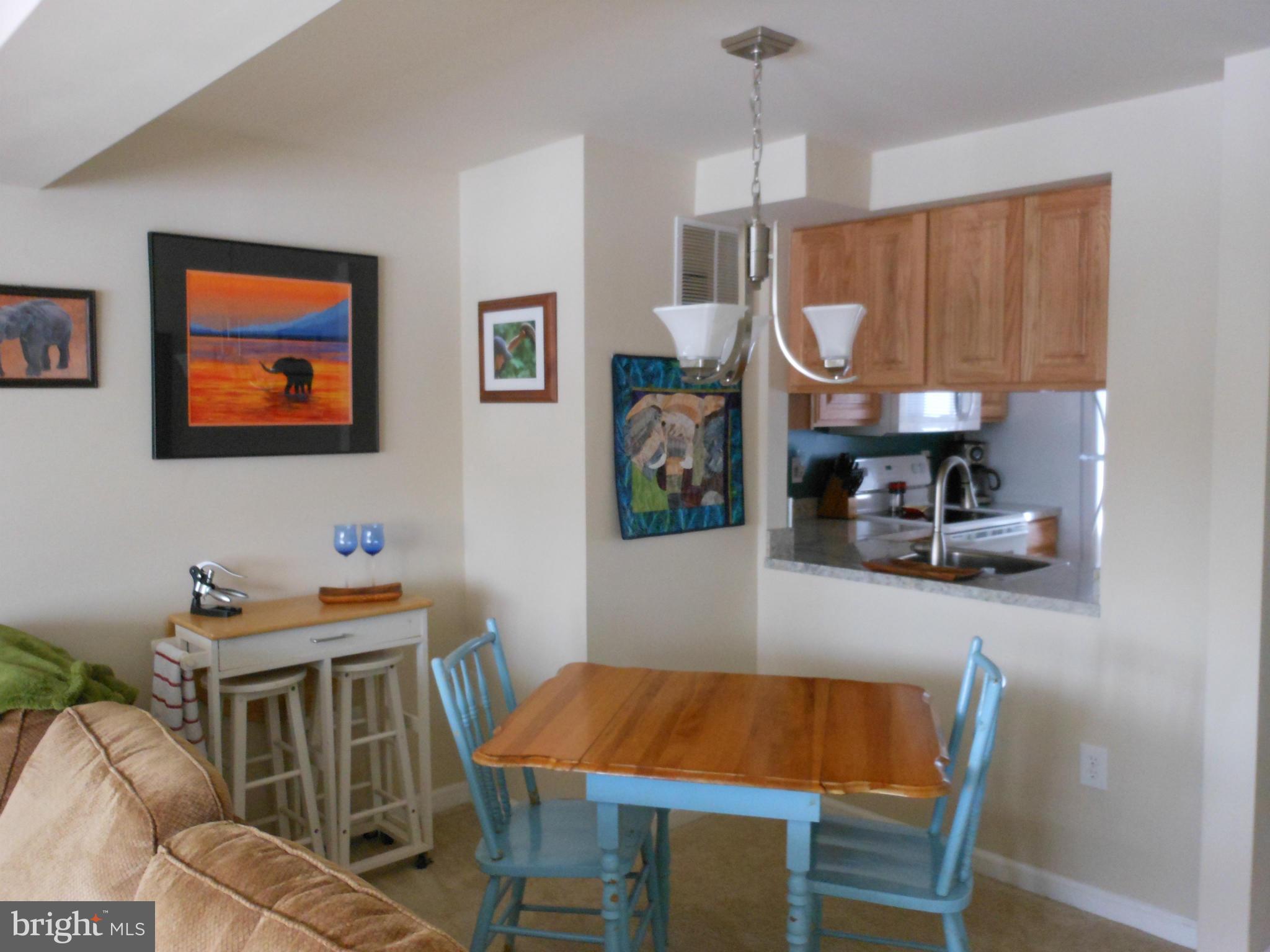 8503 Golden Ridge Court Lorton, VA 22079 - Photo 8 of 27 a dining room with furniture and window