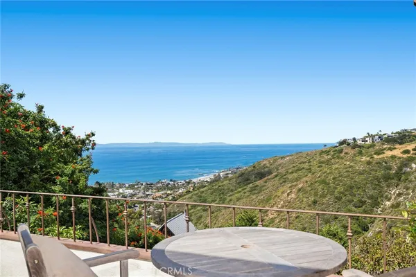 a view of a mountain from a balcony