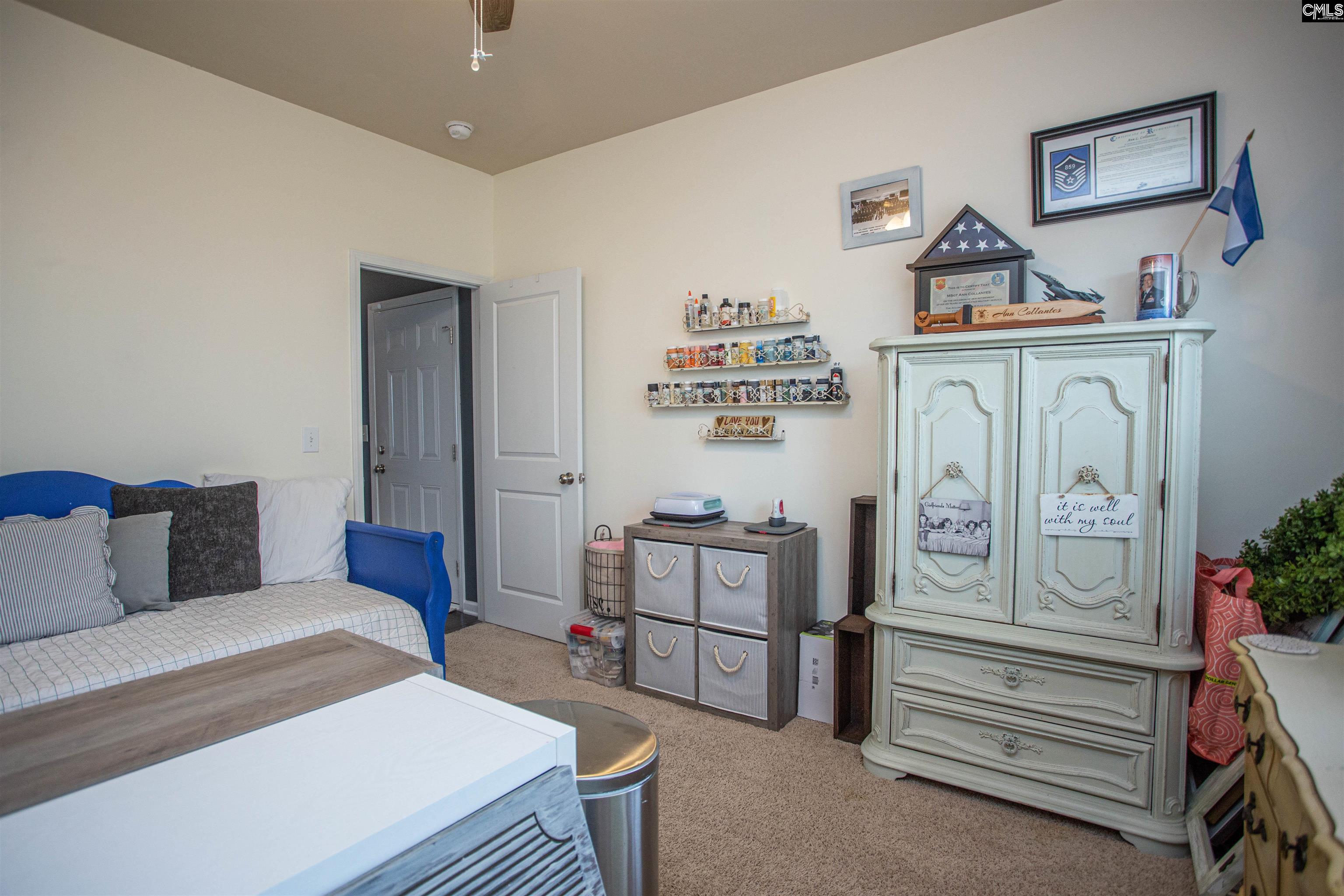 7 Templand Court Elgin, SC 29045 - Photo 23 of 47 a bedroom with furniture and window
