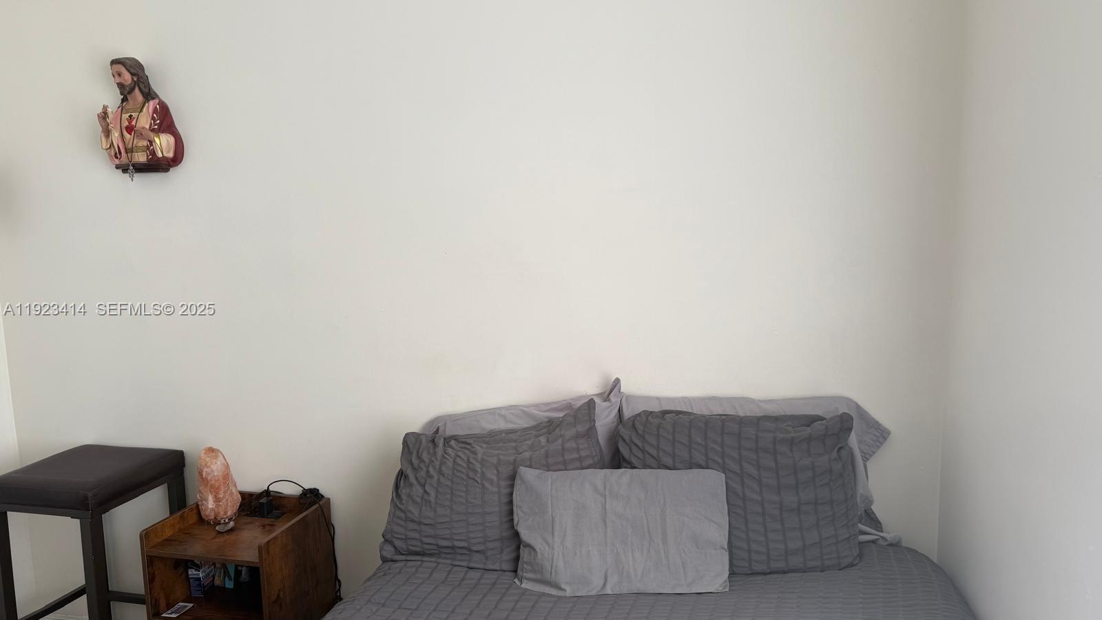 13839 Southwest 152nd Terrace Miami, FL 33177 - Photo 16 of 27 a living room with furniture and a window