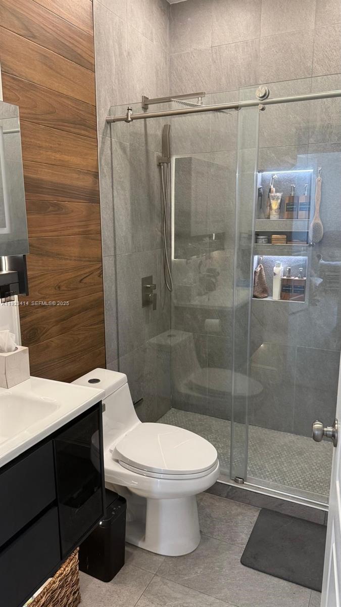 13839 Southwest 152nd Terrace Miami, FL 33177 - Photo 21 of 27 a bathroom with a toilet a sink and shower