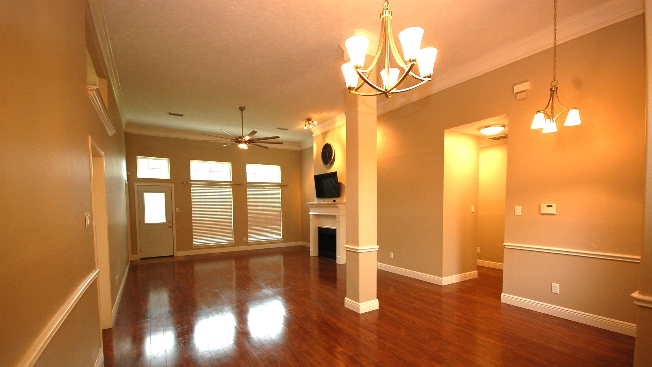 21818 Windsor Castle Drive Spring, TX 77388 - Photo 3 of 10 a view of a room with wooden floor and a window