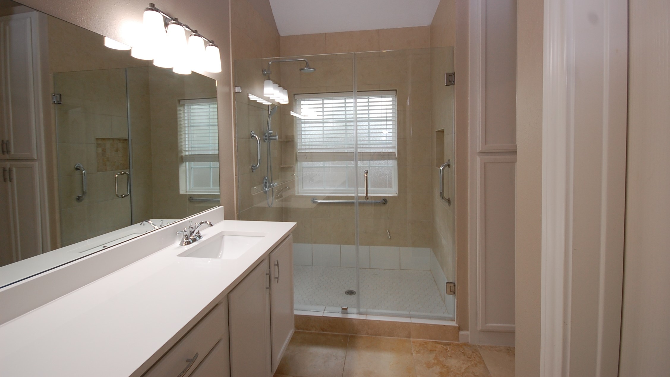 21818 Windsor Castle Drive Spring, TX 77388 - Photo 8 of 10 a bathroom with a shower sink and mirror