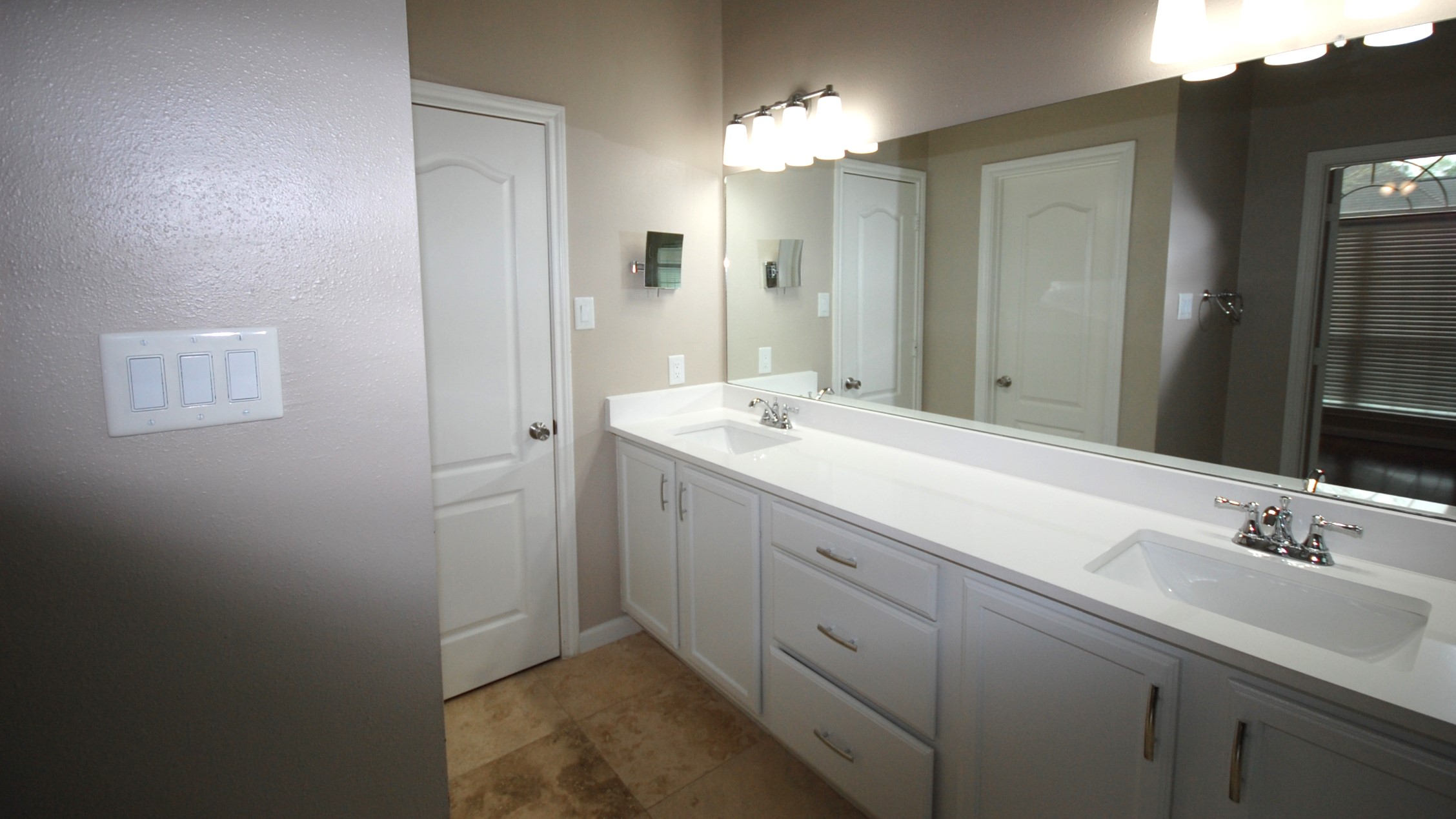 21818 Windsor Castle Drive Spring, TX 77388 - Photo 9 of 10 a bathroom with a sink and a mirror