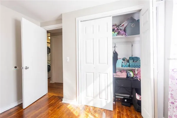 a view of a bedroom from a hallway