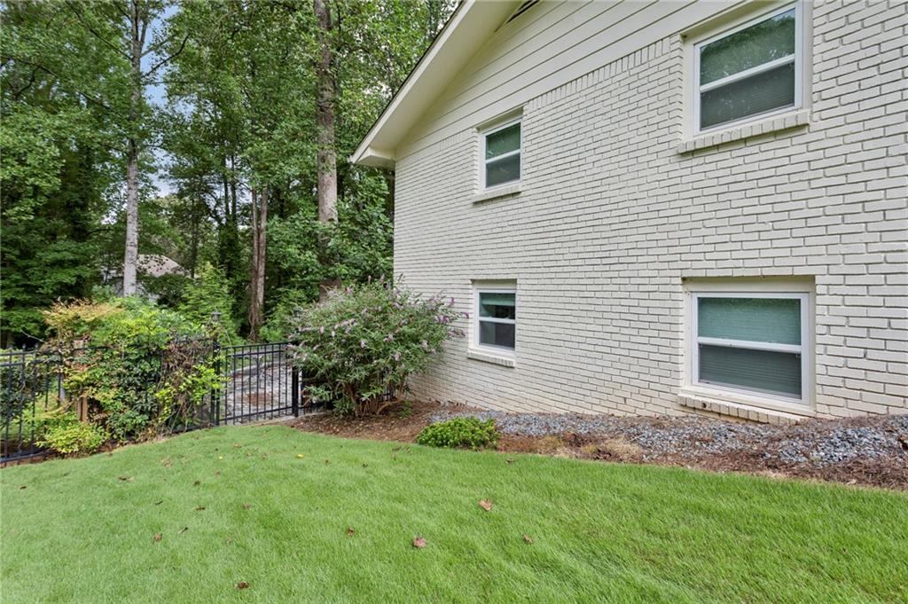 720 Brookline Drive Southeast Marietta, GA 30067 - Photo 14 of 15 a view of a house with a yard
