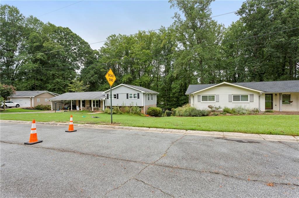 720 Brookline Drive Southeast Marietta, GA 30067 - Photo 15 of 15 a front view of house with yard and green space