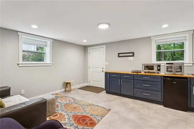 a bed room with a bed and a window