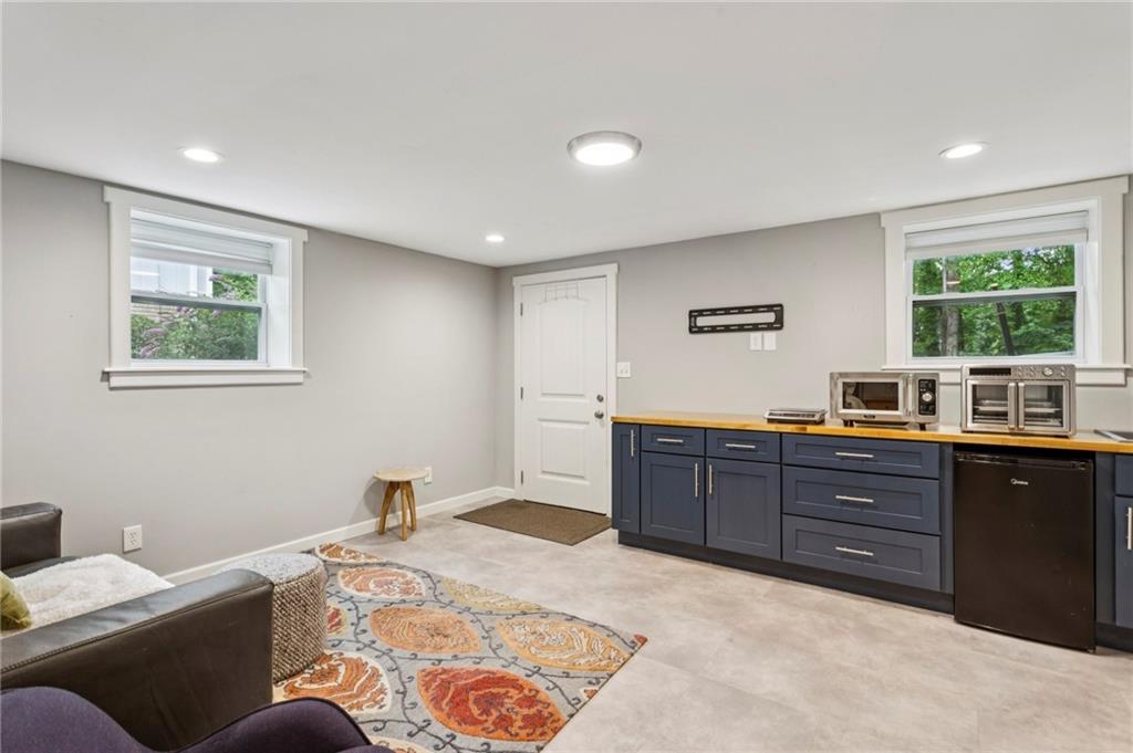 720 Brookline Drive Southeast Marietta, GA 30067 - Photo 2 of 15 a bed room with a bed and a window