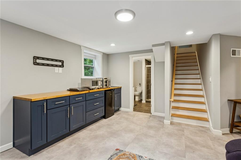 720 Brookline Drive Southeast Marietta, GA 30067 - Photo 3 of 15 a spacious bathroom with a sink and a mirror