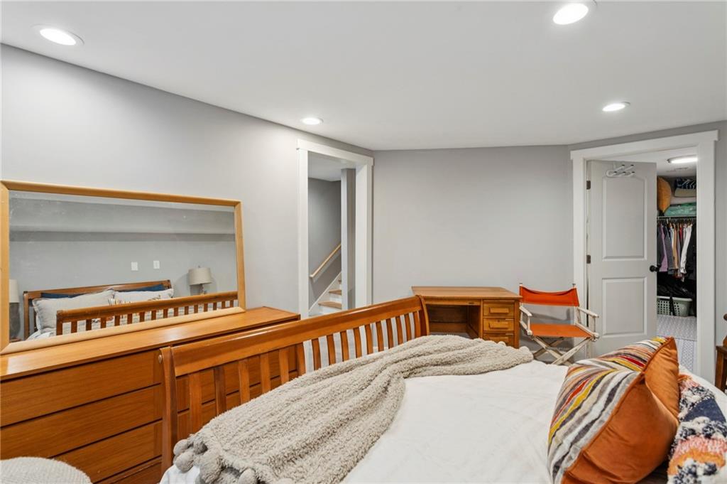 720 Brookline Drive Southeast Marietta, GA 30067 - Photo 6 of 15 a bedroom with a bed and a desk