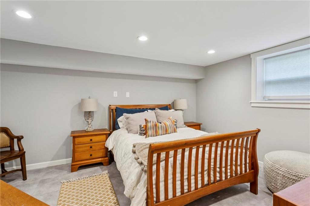 720 Brookline Drive Southeast Marietta, GA 30067 - Photo 7 of 15 a bedroom with a bed and a window