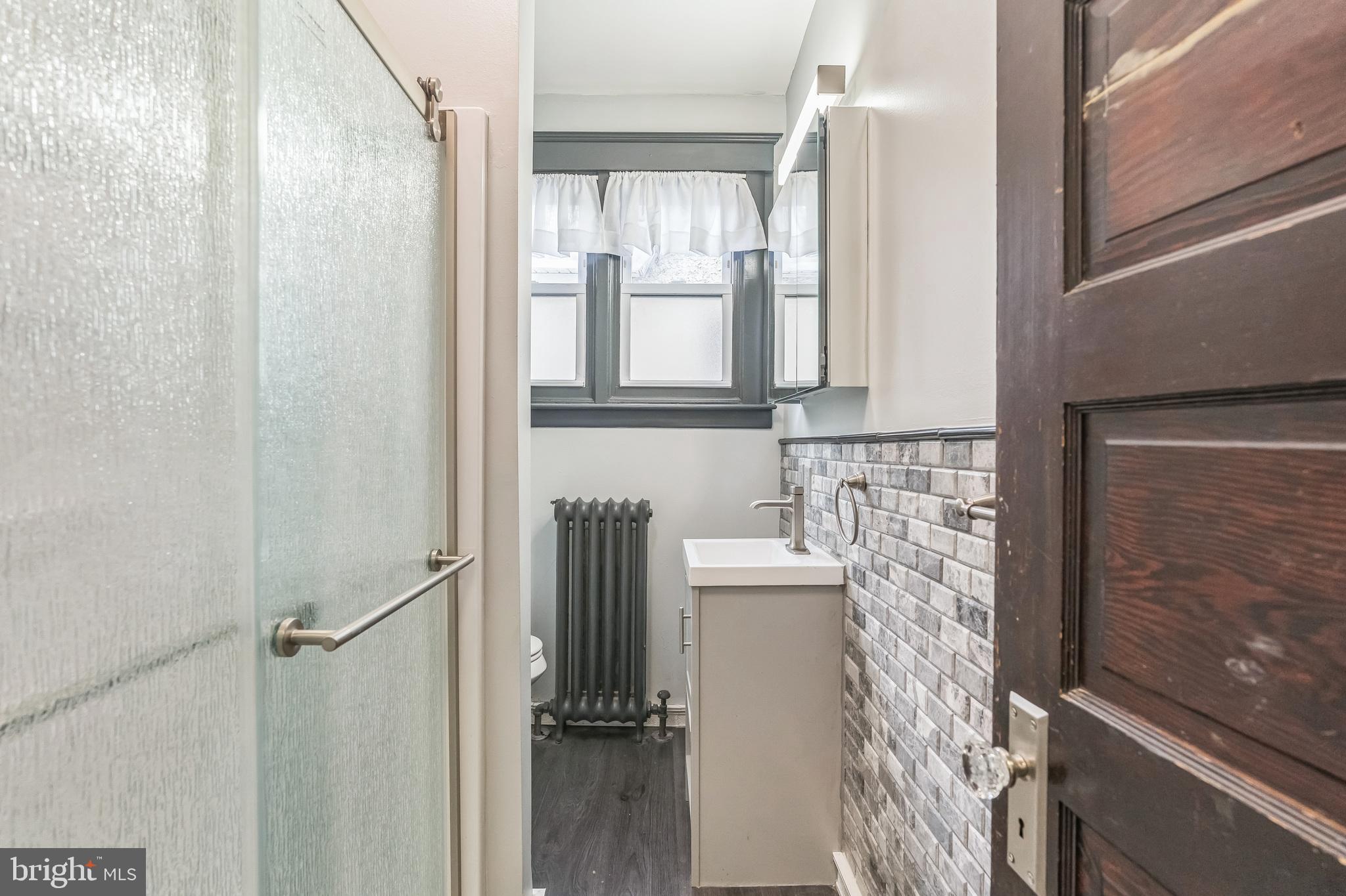 4420 Rhawn Street Philadelphia, PA 19136 - Photo 18 of 30 a bathroom with a bathtub and shower