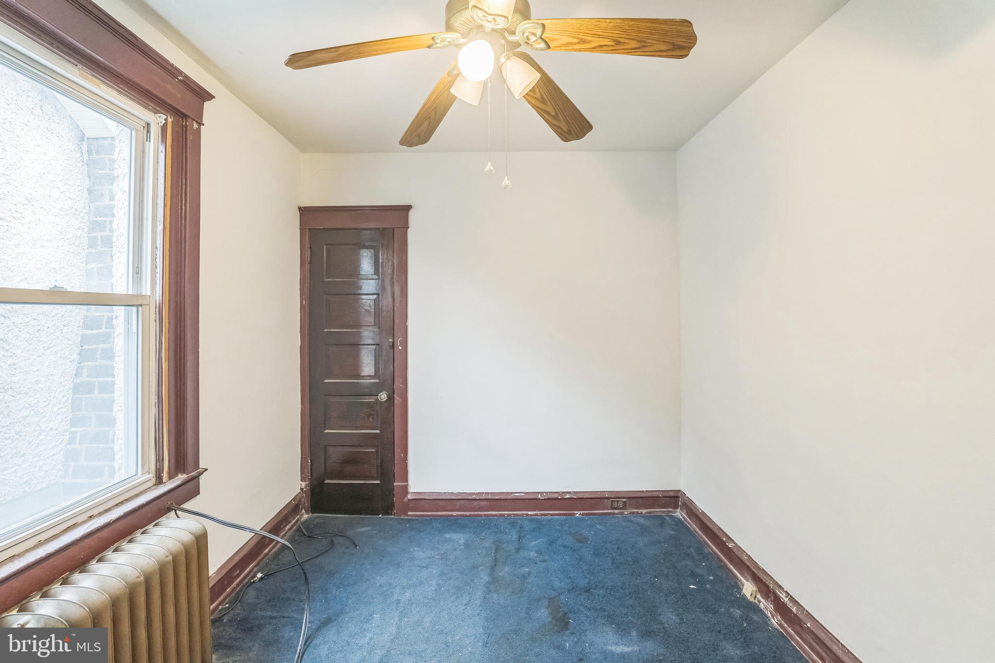 4420 Rhawn Street Philadelphia, PA 19136 - Photo 21 of 30 an empty room with windows and fan