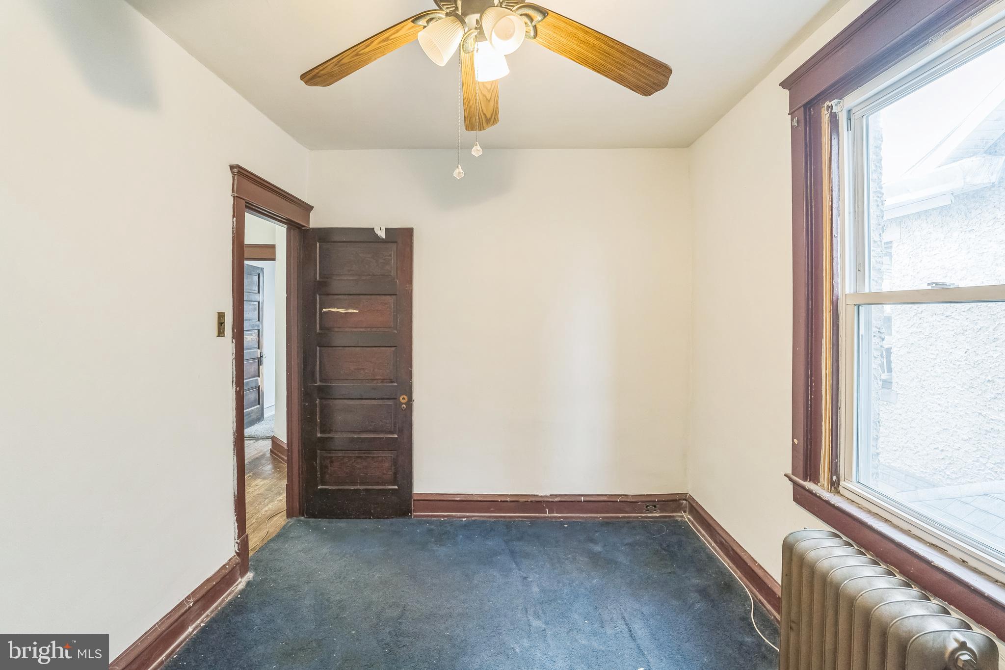 4420 Rhawn Street Philadelphia, PA 19136 - Photo 22 of 30 an empty room with windows and closet
