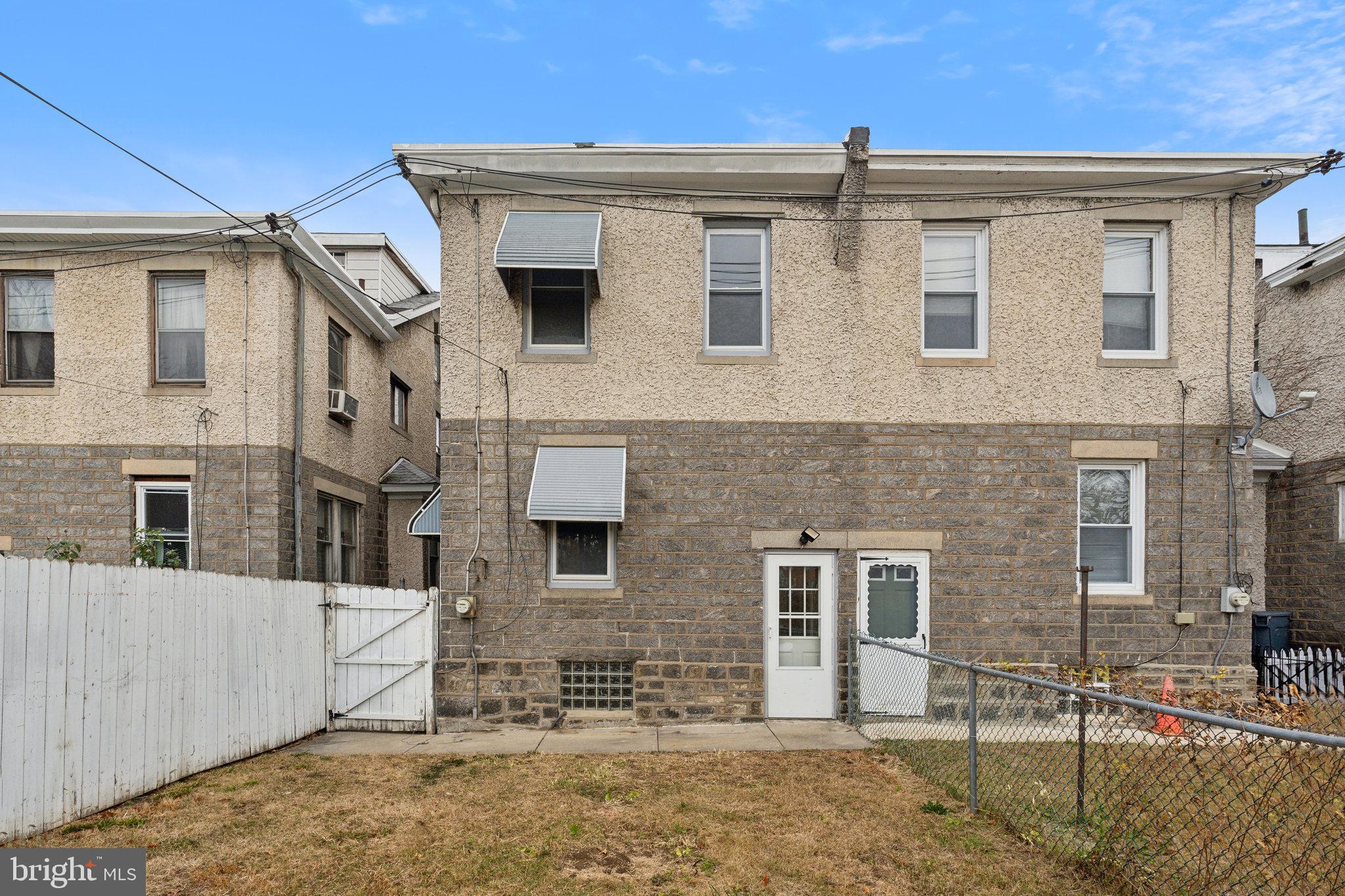 4420 Rhawn Street Philadelphia, PA 19136 - Photo 29 of 30 a front view of a house with parking area
