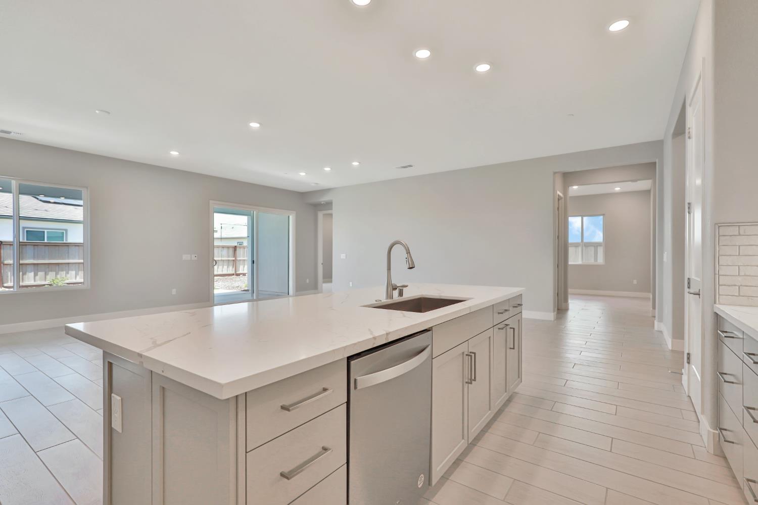 4788 Starglow Drive Penryn, CA 95663 - Photo 12 of 36 a kitchen with a sink and cabinets