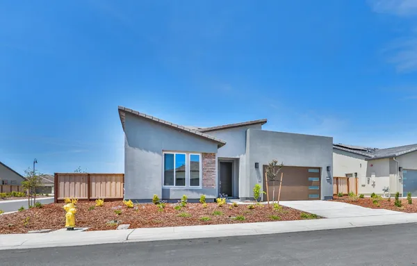 a view of a house with a patio