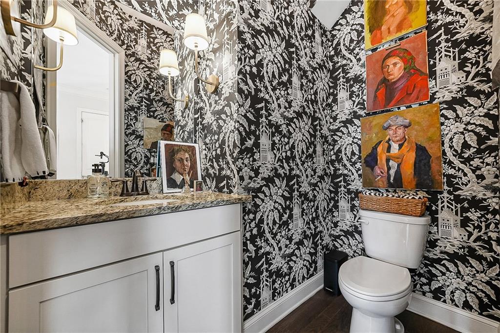 3715 Benton Lane Chamblee, GA 30341 - Photo 13 of 43 a bathroom with a toilet sink and mirror