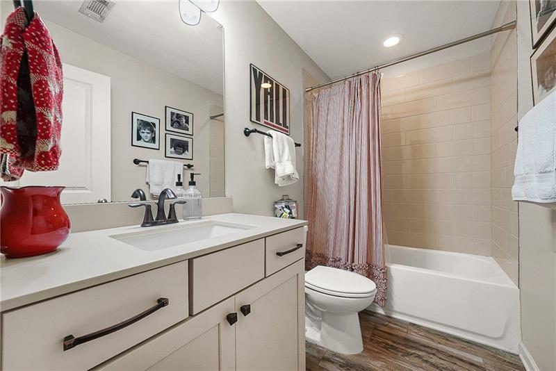 3715 Benton Lane Chamblee, GA 30341 - Photo 29 of 43 a bathroom with a sink a toilet and a bathtub