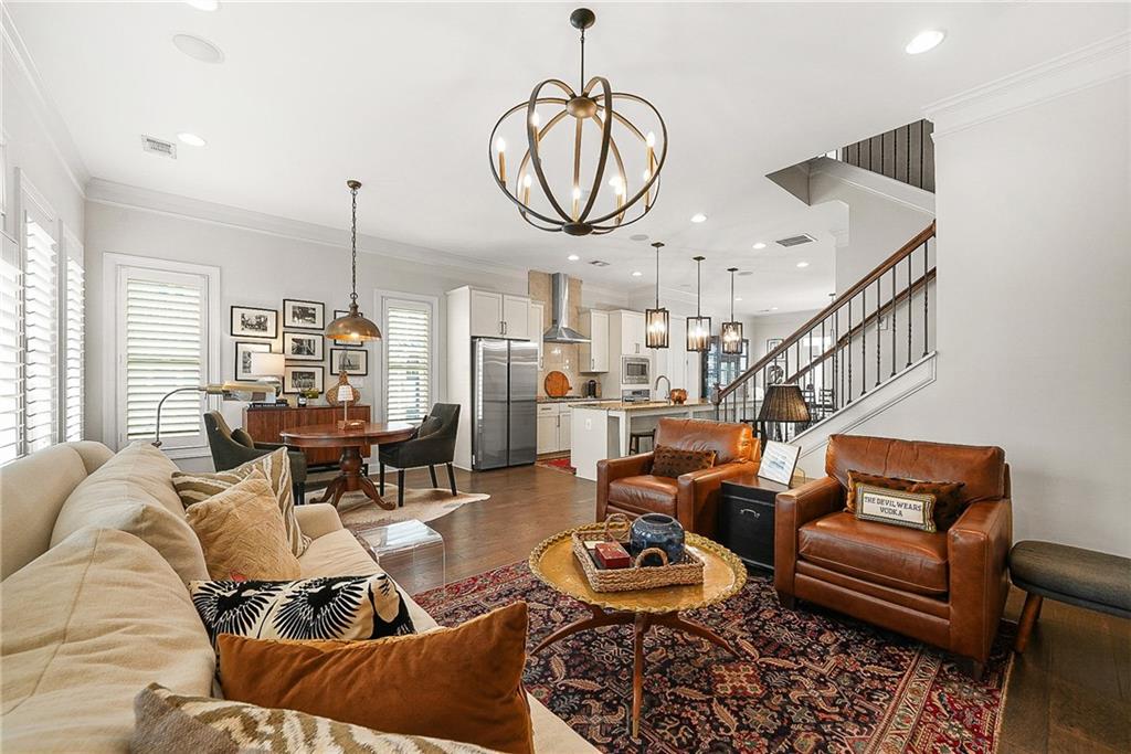 3715 Benton Lane Chamblee, GA 30341 - Photo 7 of 43 a living room with furniture a chandelier and a large window