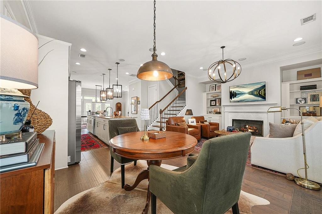 3715 Benton Lane Chamblee, GA 30341 - Photo 8 of 43 a living room with fireplace furniture and a chandelier