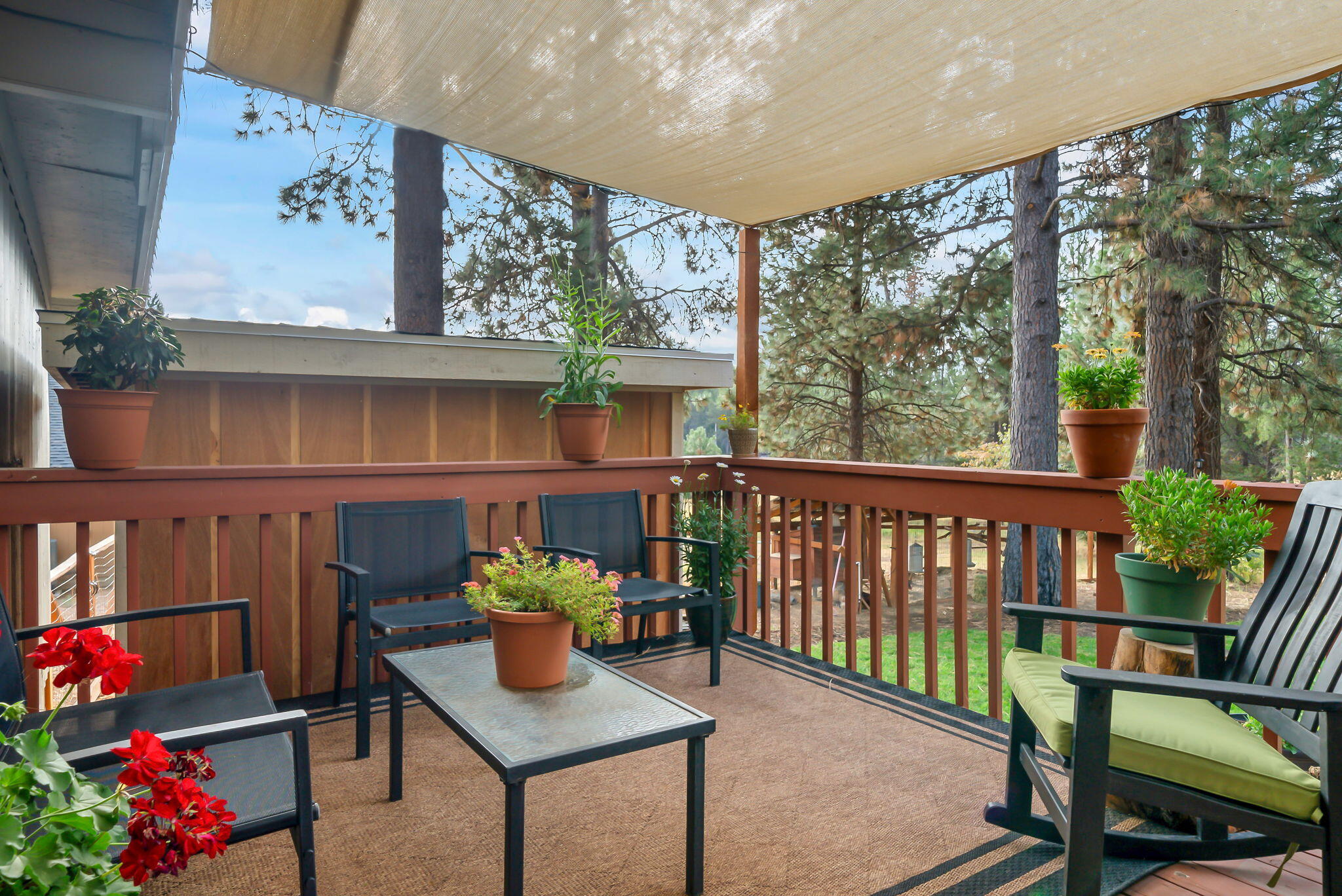 16879 Elsinore Road Bend, OR 97707 - Photo 33 of 48 a view of a chairs and table in a patio