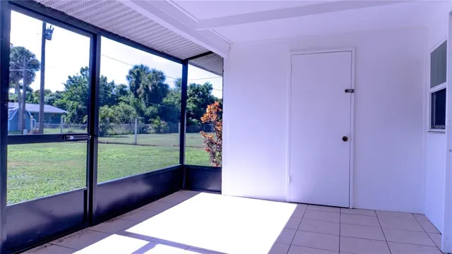 a bathroom with a bathtub sink vanity and mirror