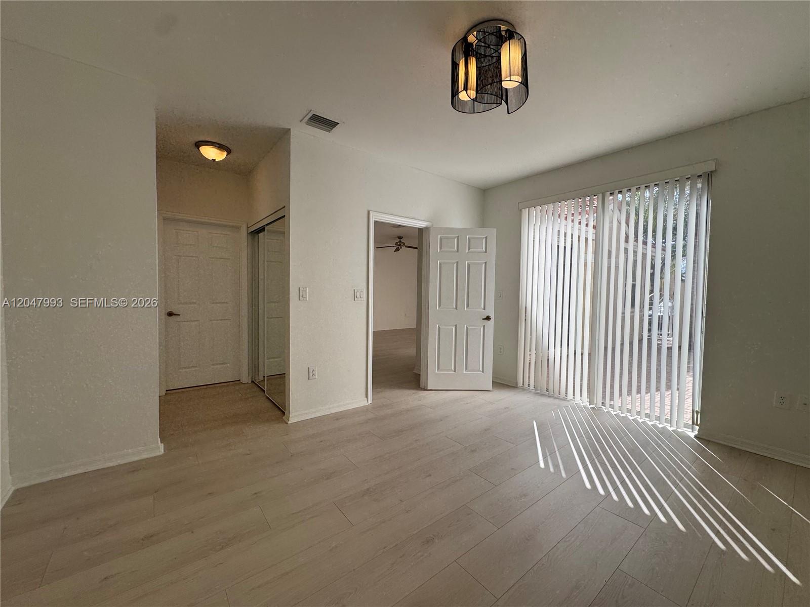 1595 Seagrape Way Hollywood, FL 33019 - Photo 16 of 39 1st Floor Primary Suite