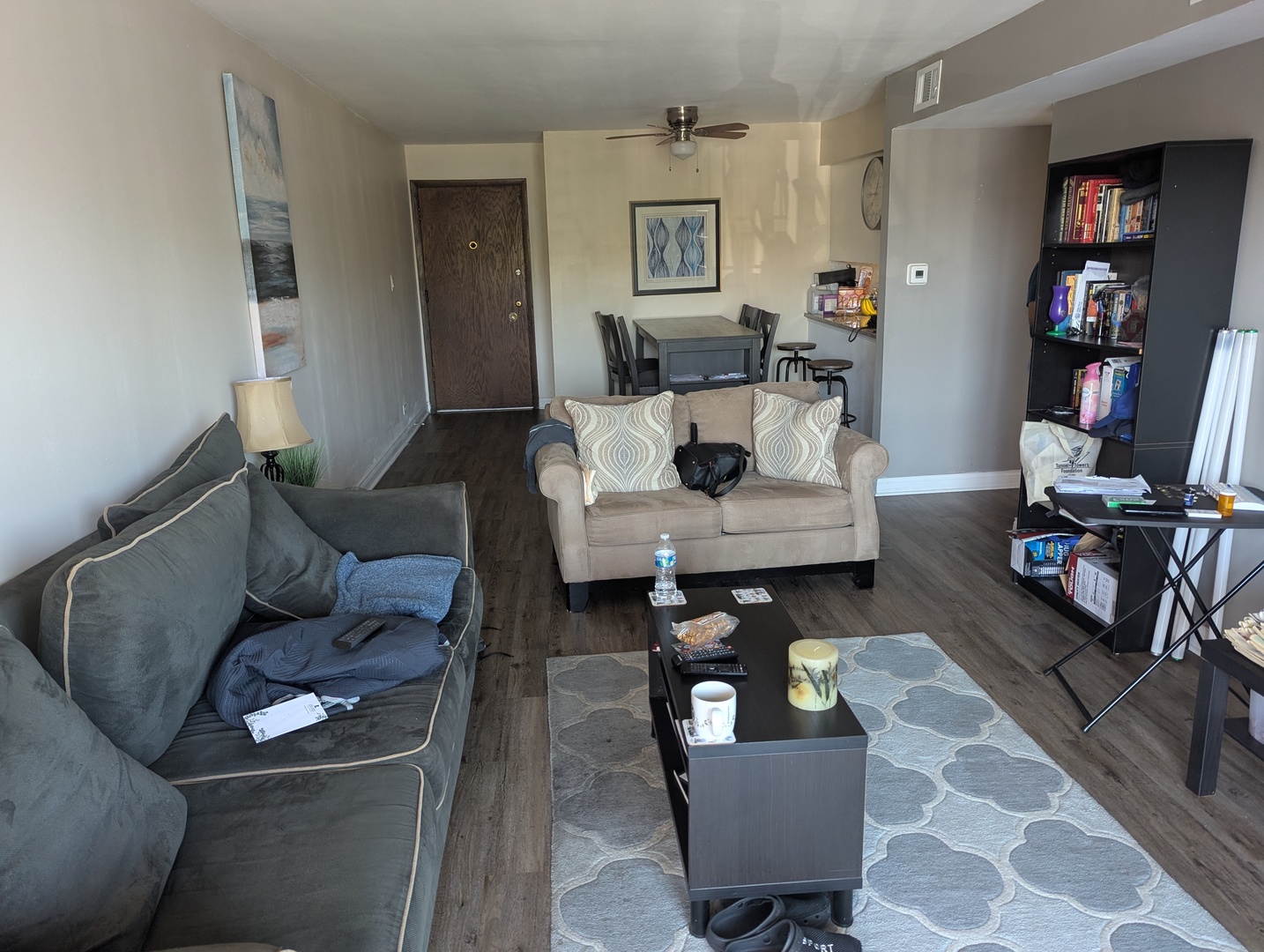 820 Elder Road, Unit 416 Homewood, IL 60430 - Photo 9 of 10 a living room with furniture and a wooden floor