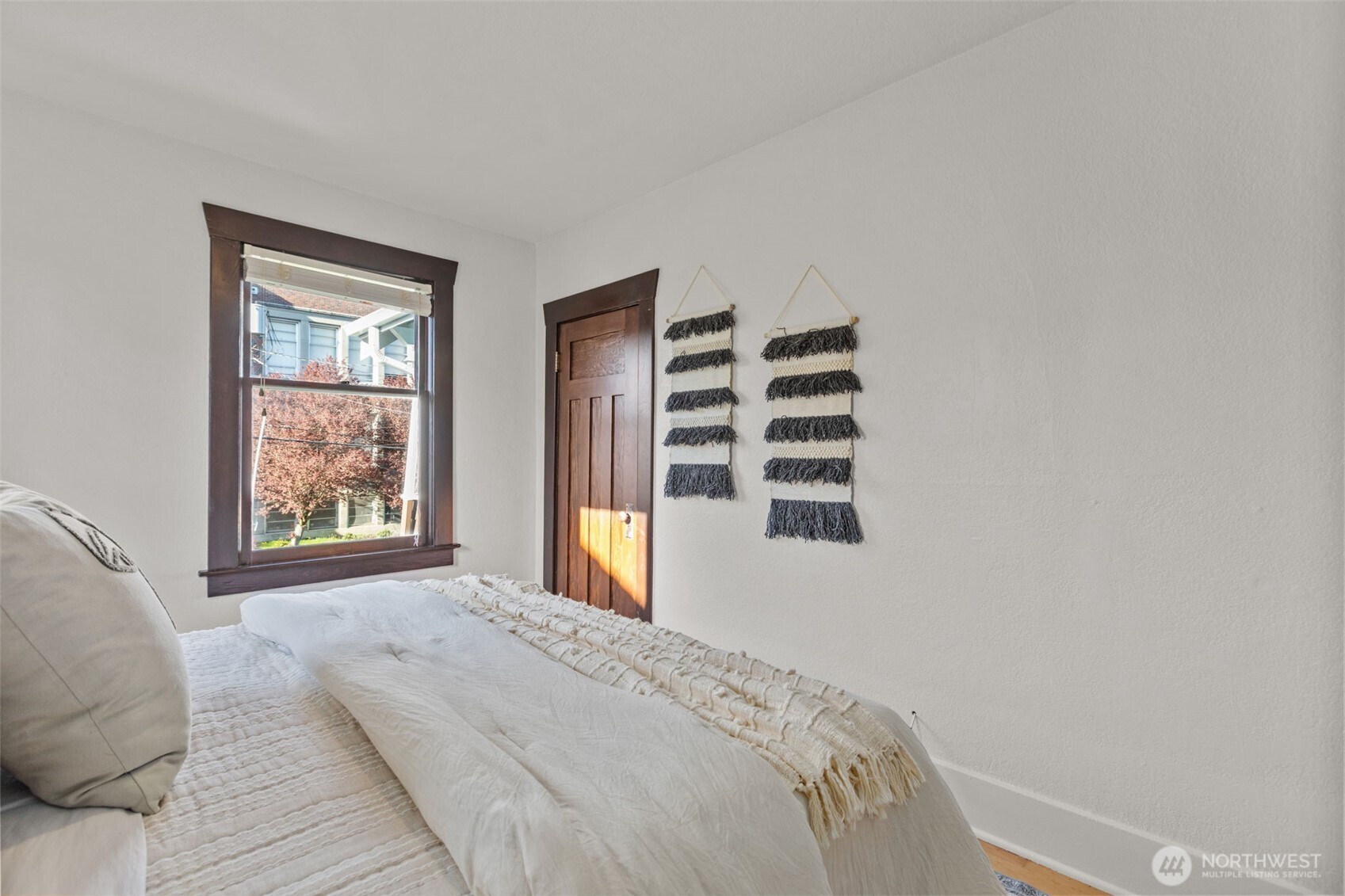 4219 South Mead Street Seattle, WA 98118 - Photo 14 of 40 a bedroom with a bed and a window