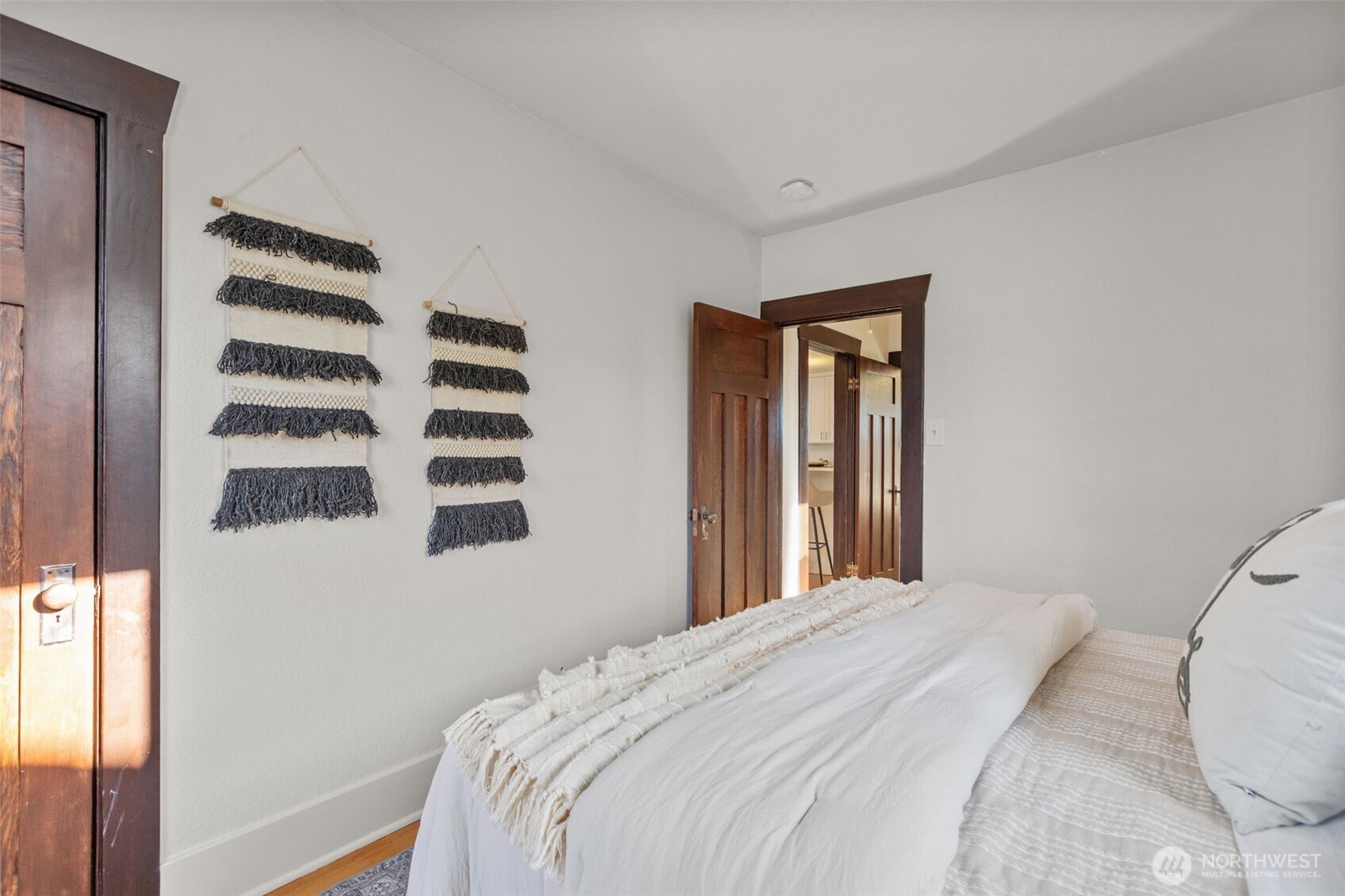 4219 South Mead Street Seattle, WA 98118 - Photo 15 of 40 a bedroom with a bed and a window