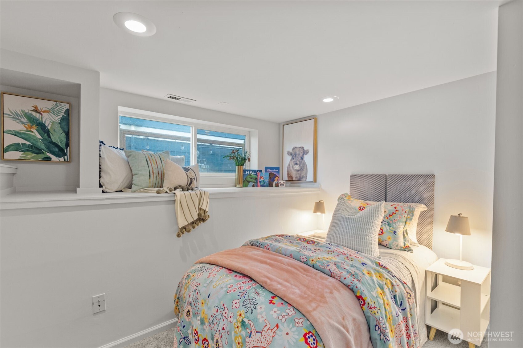4219 South Mead Street Seattle, WA 98118 - Photo 24 of 40 a bedroom with a bed and a large window