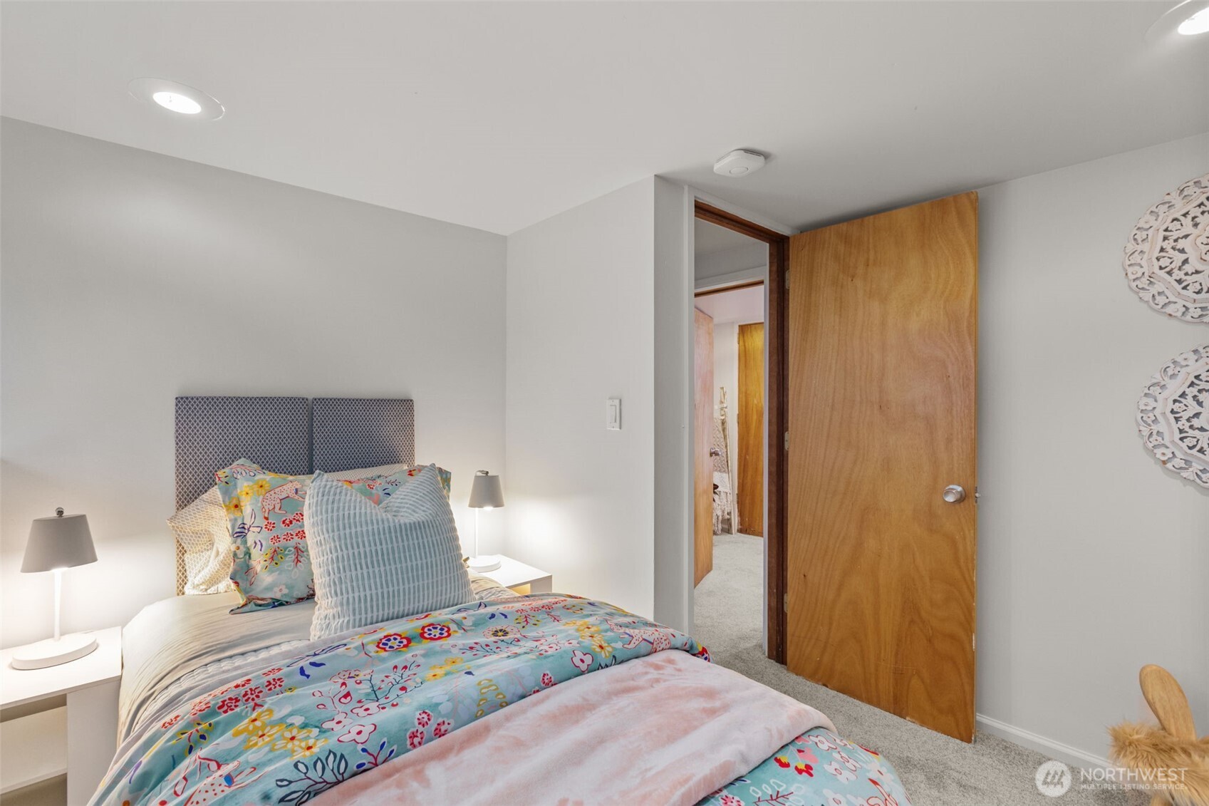 4219 South Mead Street Seattle, WA 98118 - Photo 25 of 40 a bedroom with a bed and a window