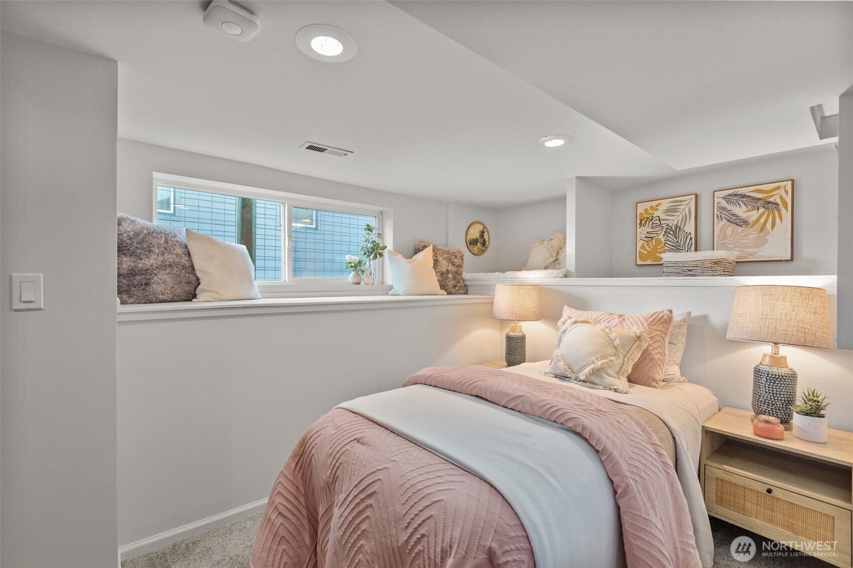 4219 South Mead Street Seattle, WA 98118 - Photo 29 of 40 a bedroom with a bed and a painting on the wall