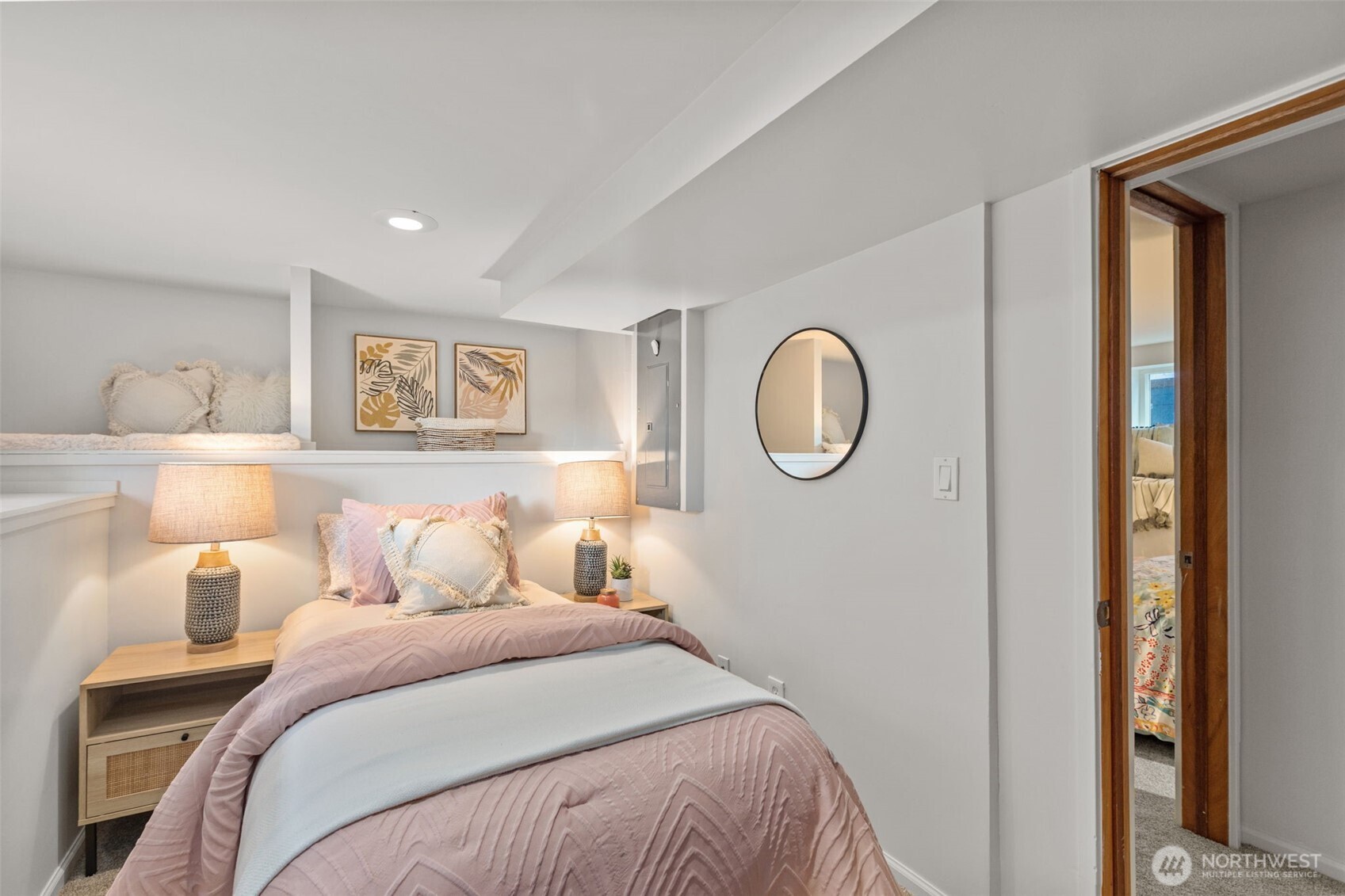 4219 South Mead Street Seattle, WA 98118 - Photo 30 of 40 a bedroom with a bed and a mirror