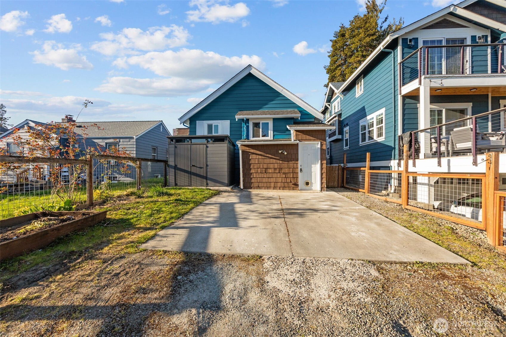 4219 South Mead Street Seattle, WA 98118 - Photo 37 of 40 a front view of a house with a yard