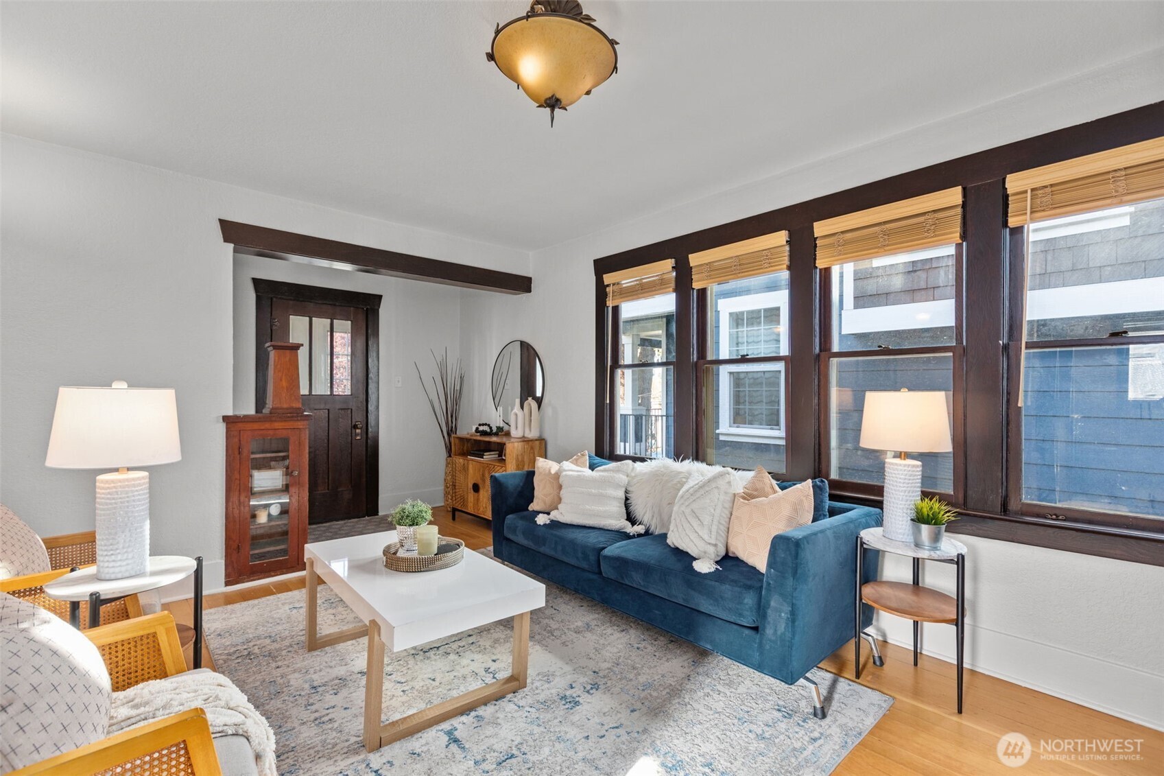 4219 South Mead Street Seattle, WA 98118 - Photo 5 of 40 a living room with furniture and a large window