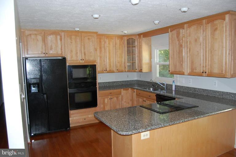 Remodeled kitchen with granite and upgraded appls
