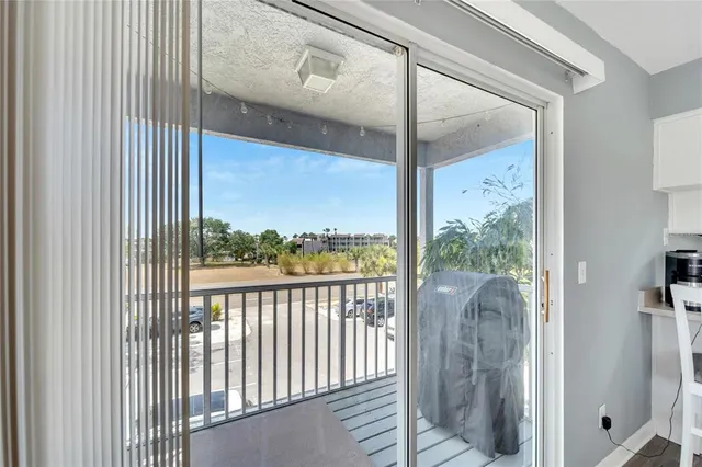 an aerial view of a houses with a lake view