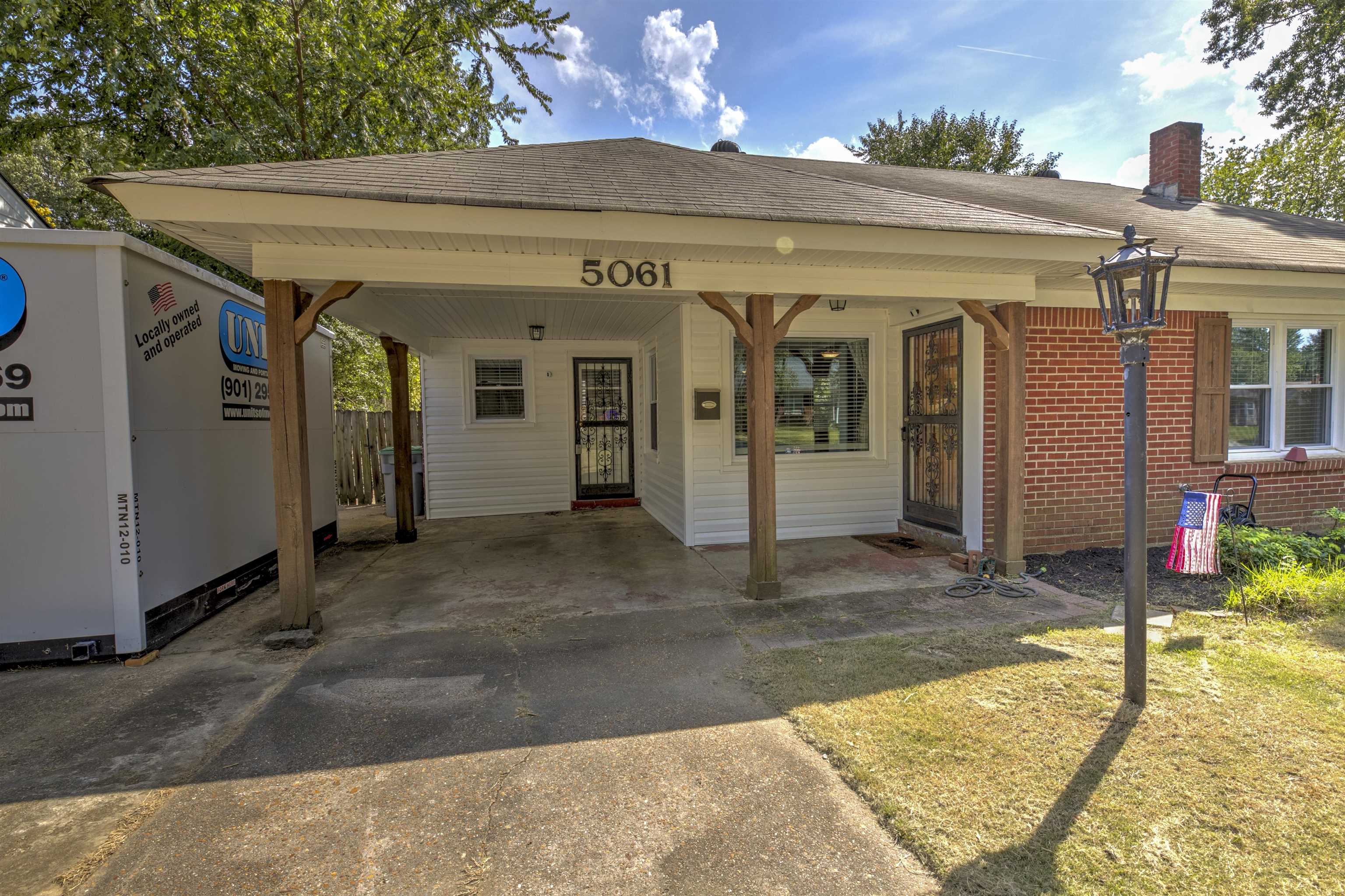 5061 Wingdale Road Memphis, TN 38117 - Photo 3 of 20 View of front. New windows Oct 2021, Interior doors replaced Dec 2020, New siding Nov 2021, New HWT May 2019, New HVAC Aug 2017