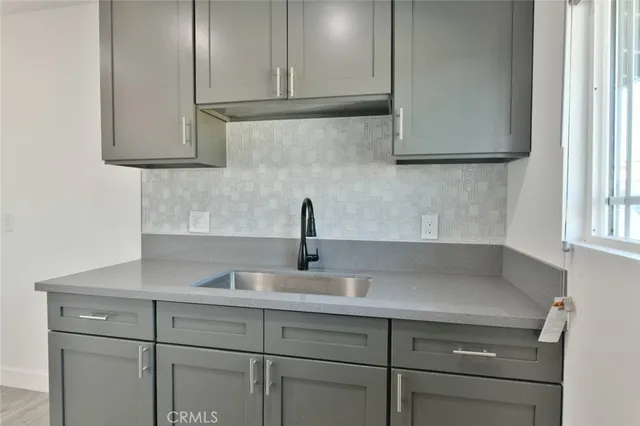 a front view of a house with garage