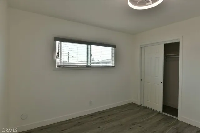 a view of kitchen and wooden floor