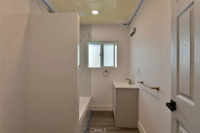 a view of backyard with a sink and dishwasher