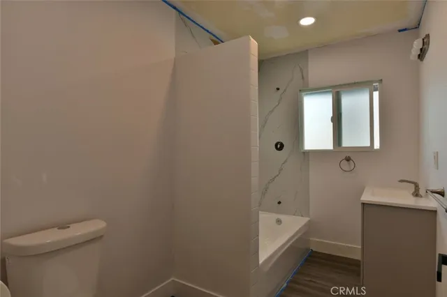 a room with storage and microwave