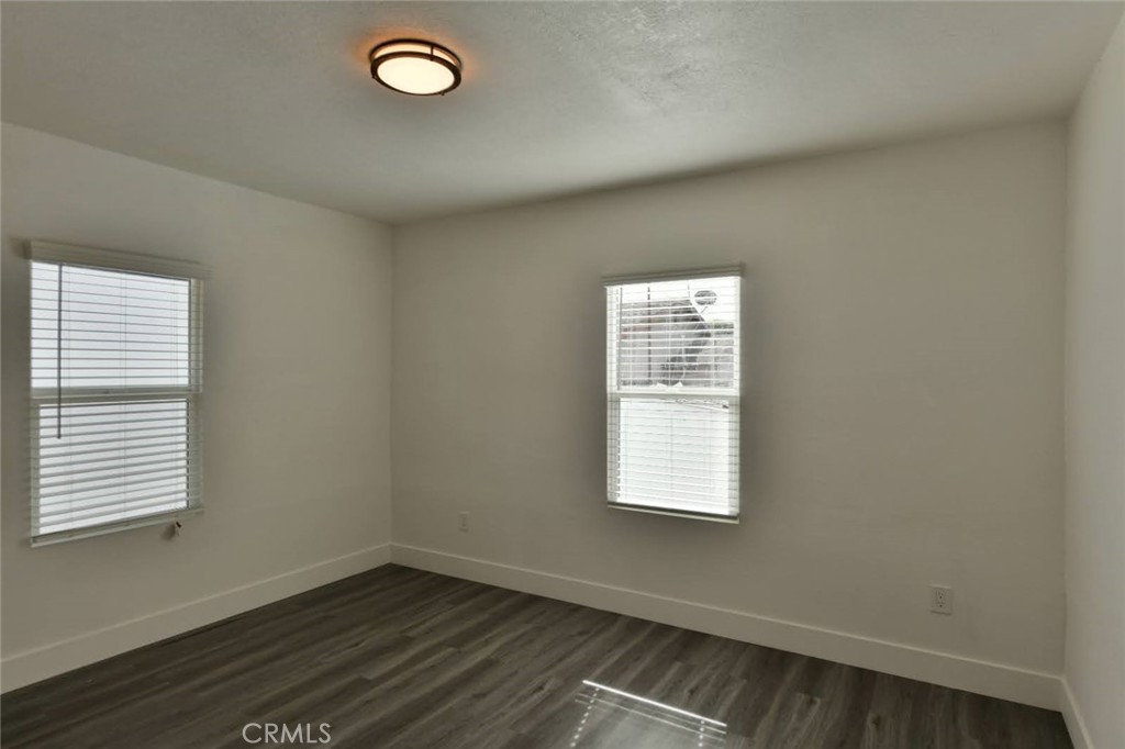 6221 Corona Avenue Bell Gardens, CA 90201 - Photo 49 of 65 an empty room with a window